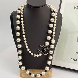 CHANEL Ivory Pearl Necklace with Black and Gold Details